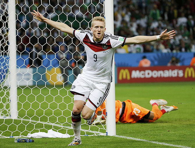 Germany's Andre Schuerrle celebrates his goal against Algeria during extra time in their 2014 World Cup round of 16 game at the Beira Rio stadium in Porto Alegre on Monday