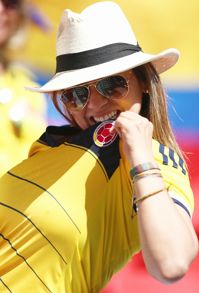 A Colombia fan enjoys the atmosphere