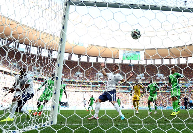 Paul Pogba scores the first goal for France against Nigeria