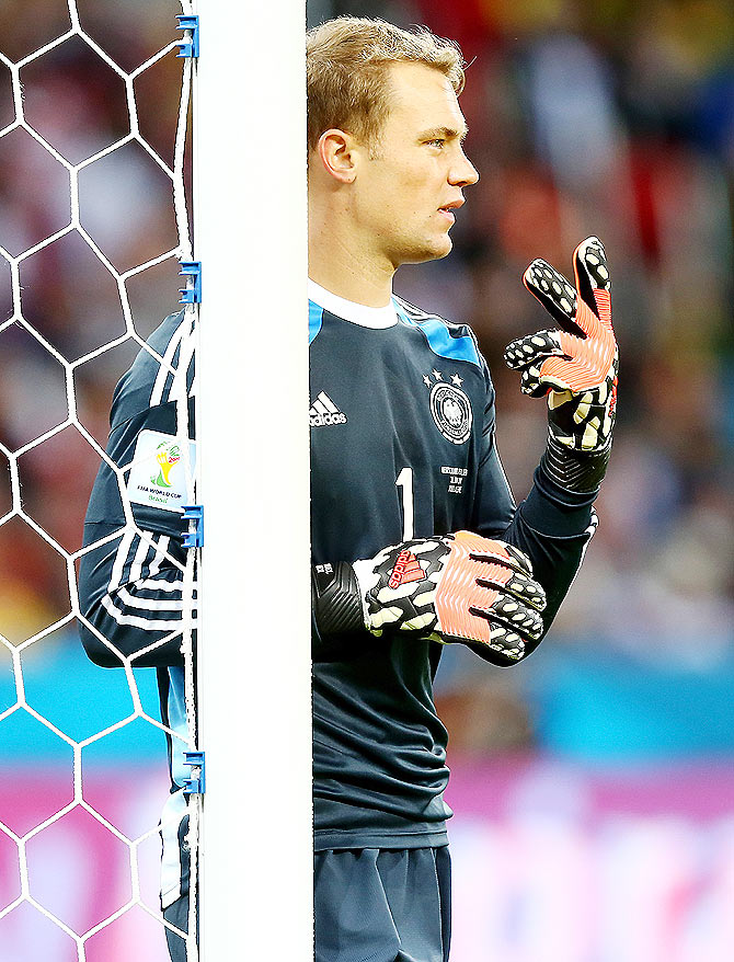 Goalkeeper Manuel Neuer of Germany gestures during their World Cup Round of 16 match against Algeria