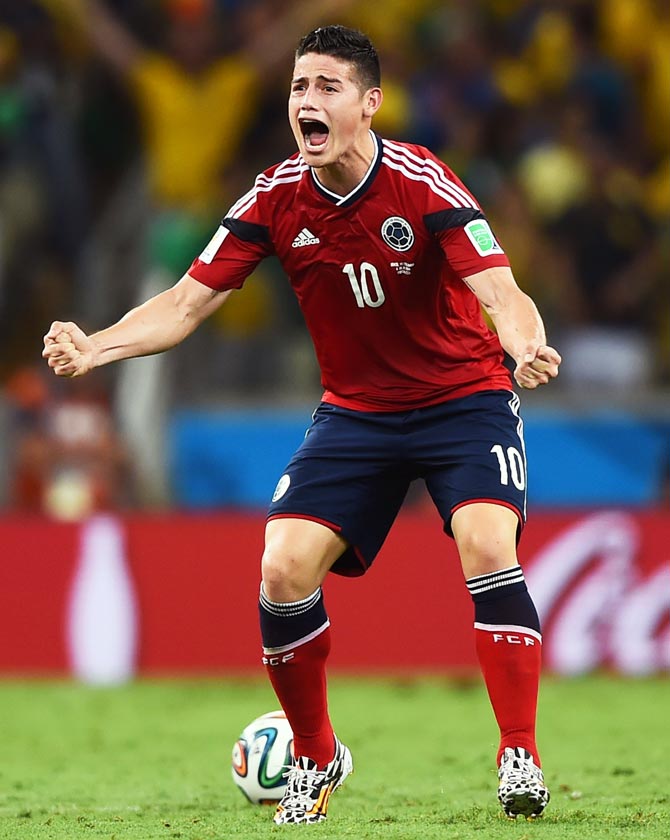 James Rodriguez of Colombia celebrates scoring against Colombia