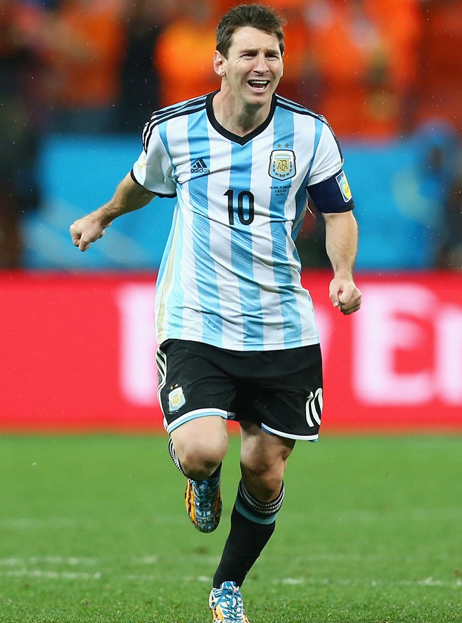 Lionel Messi of Argentina celebrates defeating the Netherlands in a shootout