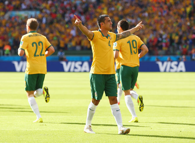 Tim Cahill of Australia celebrates after scoring his team's first goal against the Netherlands