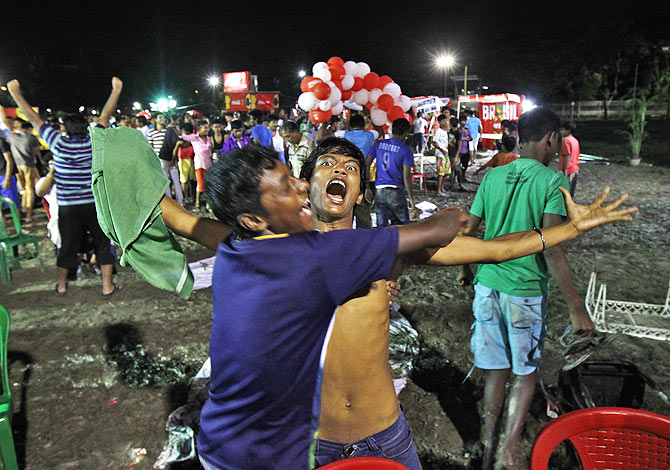 Fans of Germany celebrate in Kolkata after the 2014 World Cup final on Sunday