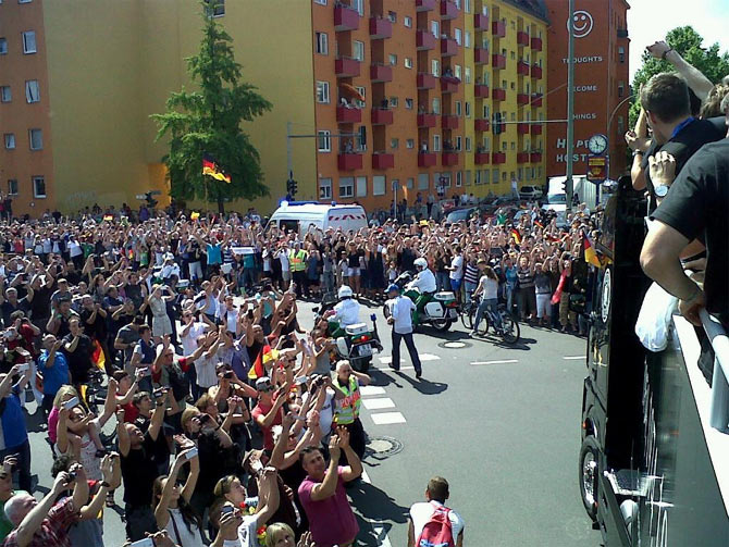 Crowds welcome the team bus at Fan Mile in Berlin on Tuesday