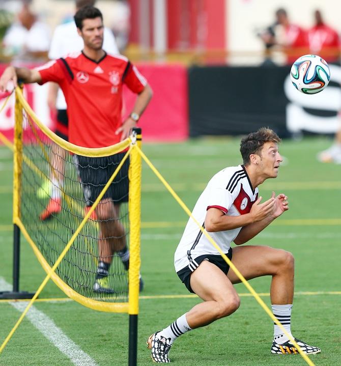 Mesut Oezil of Germany controls the ball during the German national team training session