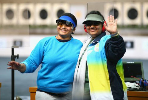 Gold Medalist Rahi Sarnobat of India (L) and Silver Medalist Anisa Sayyed of India (R) celebrate together at the end of the Women's 25m Pistol Shooting on Saturday