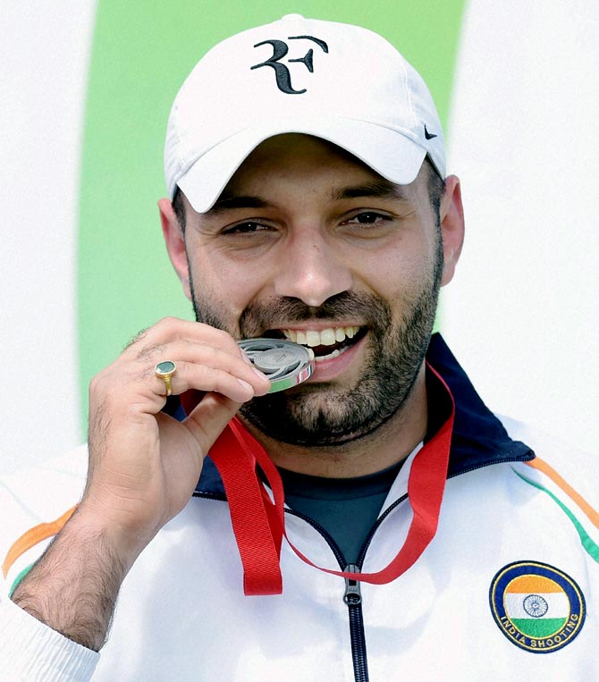 India's Harpreet Singh celebrates after winning the silver medal