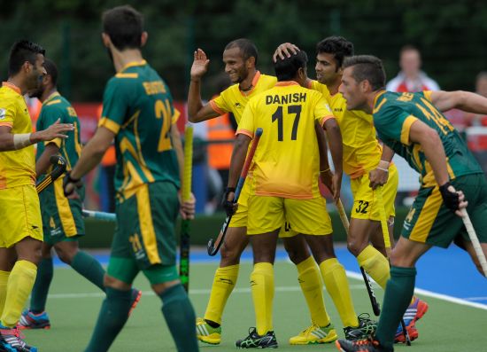 Indian players celebrate after scoring a goal against South Africa