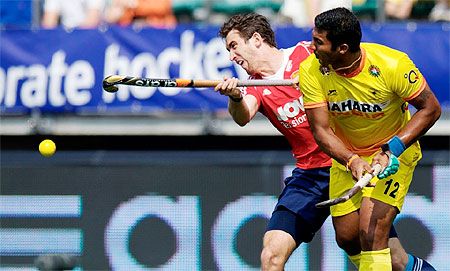 Action from the Hockey World Cup match played between India and England on Monday