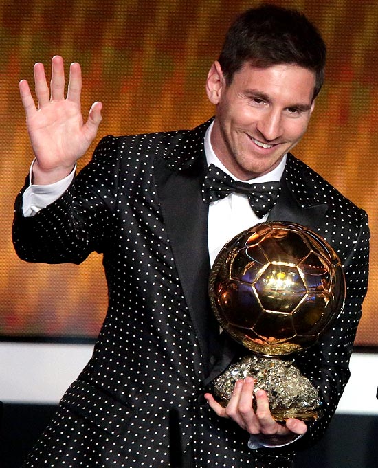 Lionel Messi with the FIFA Ballon d'Or 2012 trophy