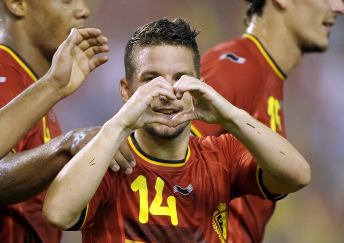 Belgium's Dries Mertens reacts after scoring against Tunisia