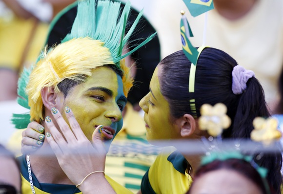 Fans of Brazil wait for the start of the match