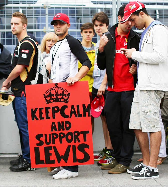 A Lewis Hamilton of Great Britain and Mercedes GP fan queues to enter the circuit ahead of the Canadian Formula One Grand Prix