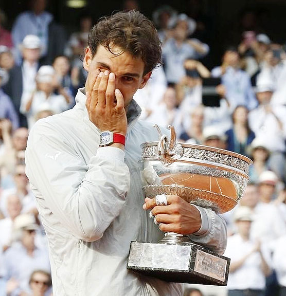 Rafael Nadal of Spain cries as he attends the trophy ceremony after defeating Novak Djokovic of Serbia on Sunday