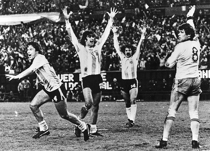 Argentina players celebrate as they score a goal during the 1978 World Cup final match against Hungary