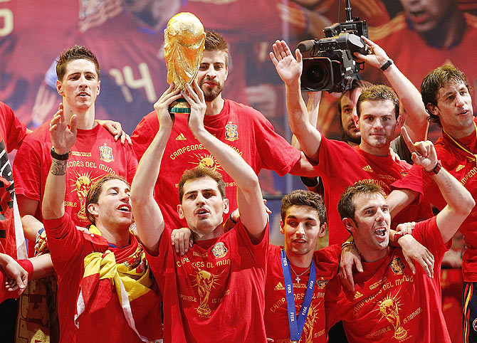Iker Casillas of Spanish national football team holds the trophy during the Spanish team's victory parade following their 2010 FIFA World Cup win on July 12, 2010