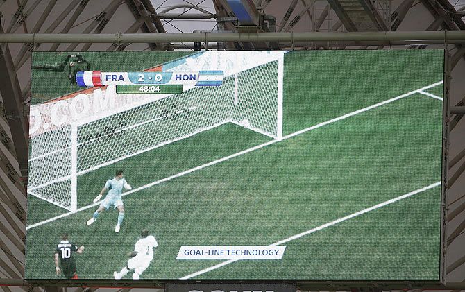 A video replay of France's Karim Benzema's goal using goal-line technology is pictured on a screen during their 2014 World Cup Group E soccer match against Honduras at the Beira Rio stadium in Porto Alegre during the 2018 FIFA World Cup