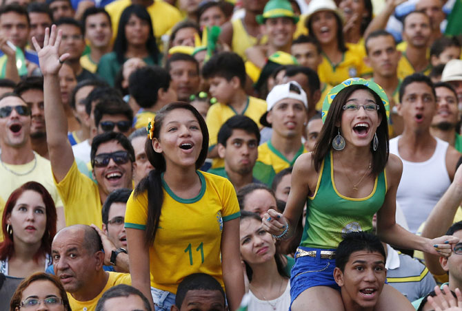 Brazilian fans celebrate at Copacabana beach in Rio
