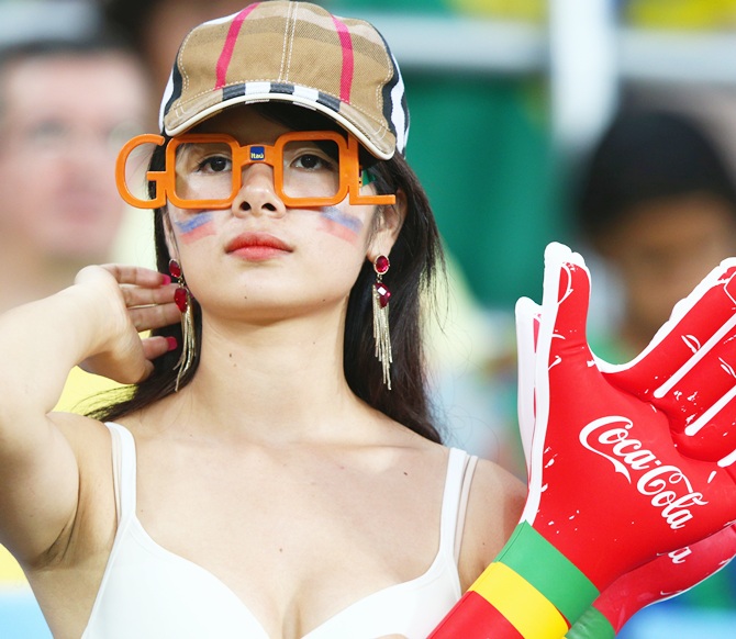 A fan looks on during the 2014 FIFA World Cup Brazil Group H match between Russia and South Korea at Arena Pantanal