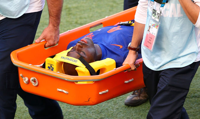 Bruno Martins Indi of the Netherlands is stretchered off the field