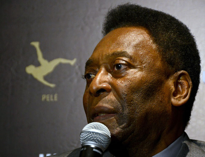 Brazilian soccer legend Pele speaks at a news conference