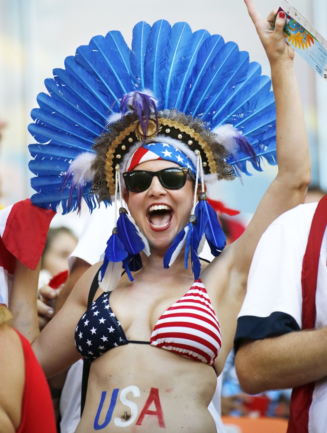 A US fan cheers during the 2014 World Cup G match between Portugal and the US at the Amazonia arena in Manaus