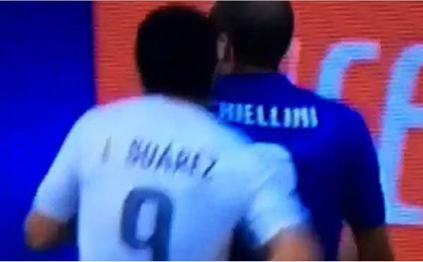 Video grab of Uruguay's Luis Suarez biting Italy's Giorgio Chiellini from behind during the World Cup Group D match