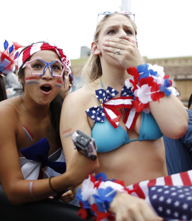 US fans react during the 2014 World Cup Group G match between Germany and the US at a viewing party in Hermosa Beach, California