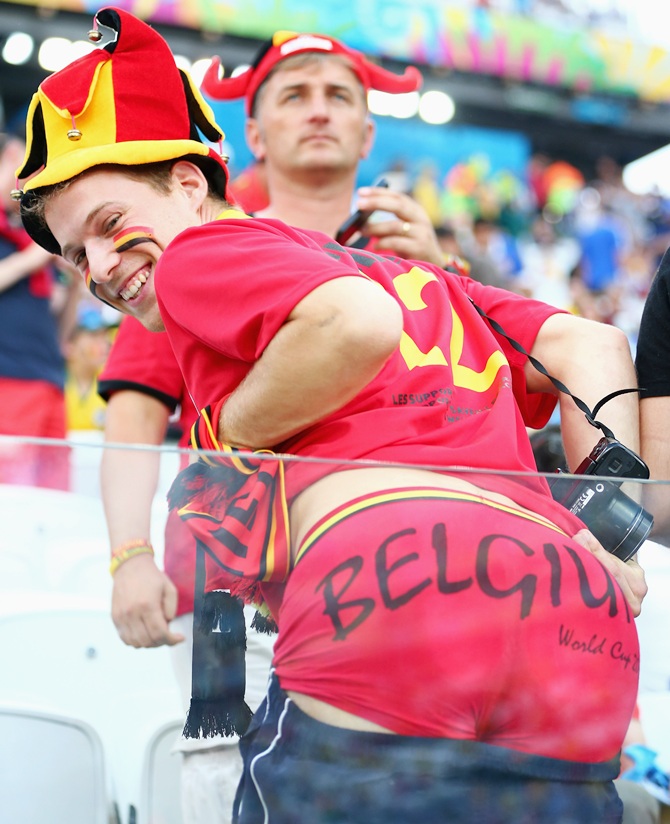 A Belgium fan poses during the 2014 FIFA World Cup Brazil Group H match between South Korea and Belgium at Arena de Sao Paulo