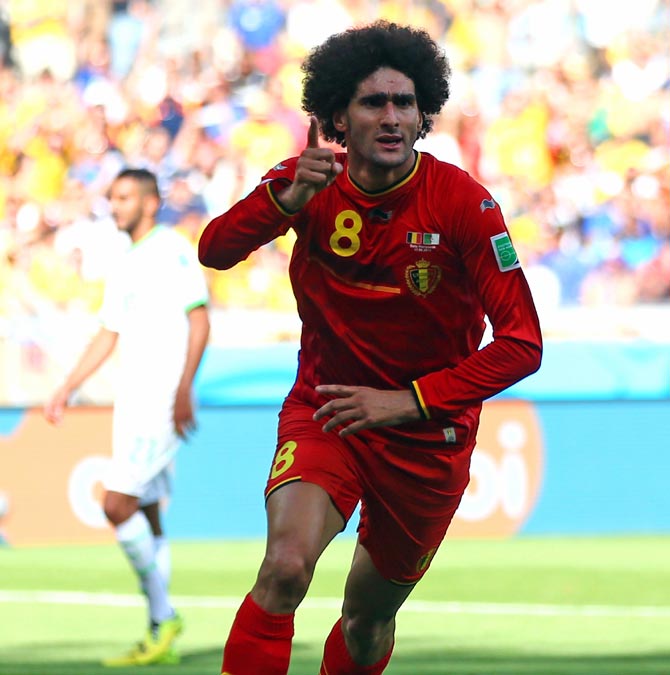 Marouane Fellaini of Belgium celebrates scoring his team's first goal against Algeria