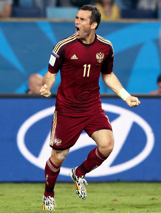 Aleksandr Kerzhakov of Russia celebrates after scoring his team's first goal against South Korea