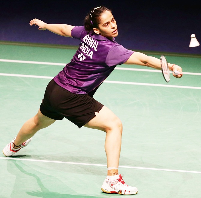 Saina Nehwal plays a dribble at the net