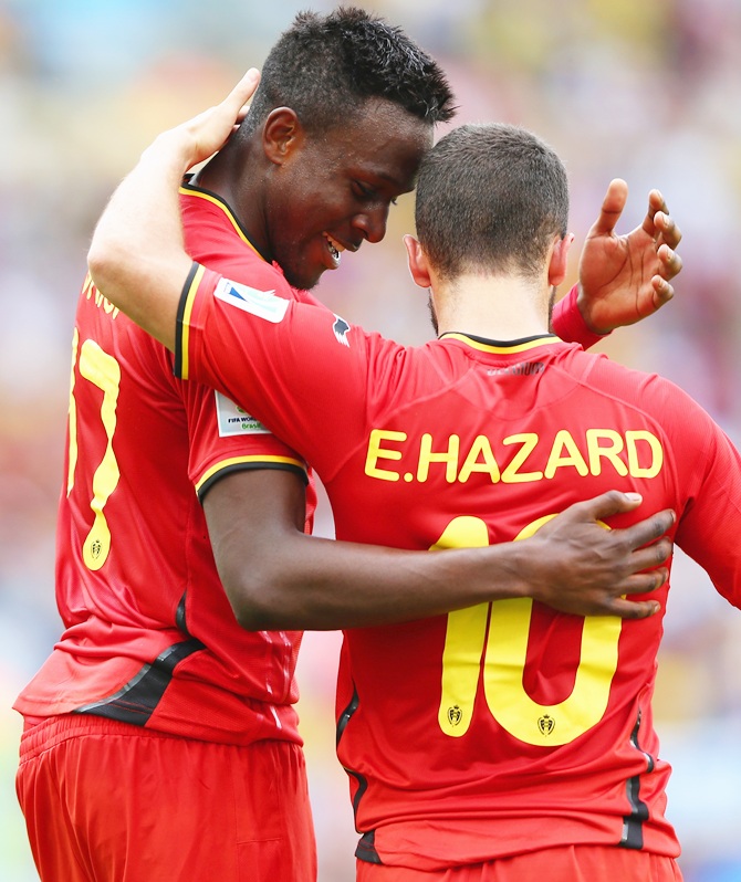 Divock Origi of Belgium celebrates scoring with Eden Hazard