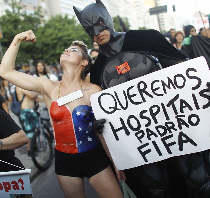 Protesters demonstrate against the staging of the upcoming 2014 World Cup