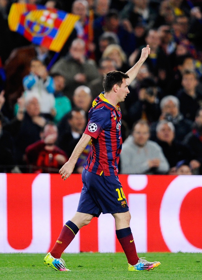 Lionel Messi of Barcelona celebrates after scoring the opening goal