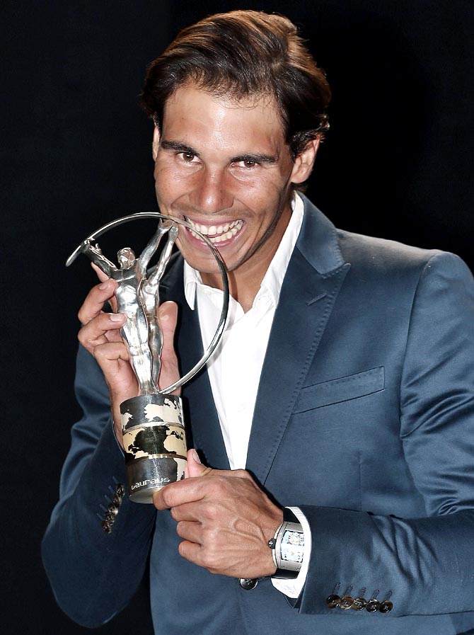 Rafael Nadal winner of the Laureus World Comeback of the Year award poses with his trophy