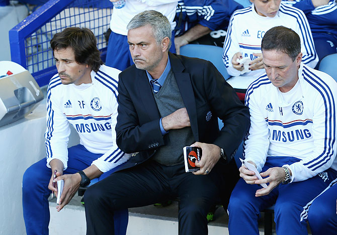 Chelsea Manager Jose Mourinho (centre) with assistants Rui Faria (left) and Steve Holland 