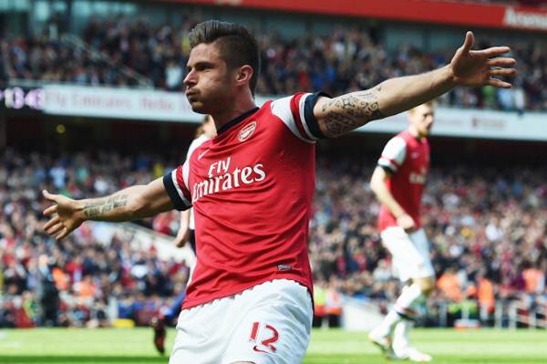Olivier Giroud of Arsenal celebrates after scoring during the Barclays Premier League match against West Bromwich Albion at the Emirates Stadium
