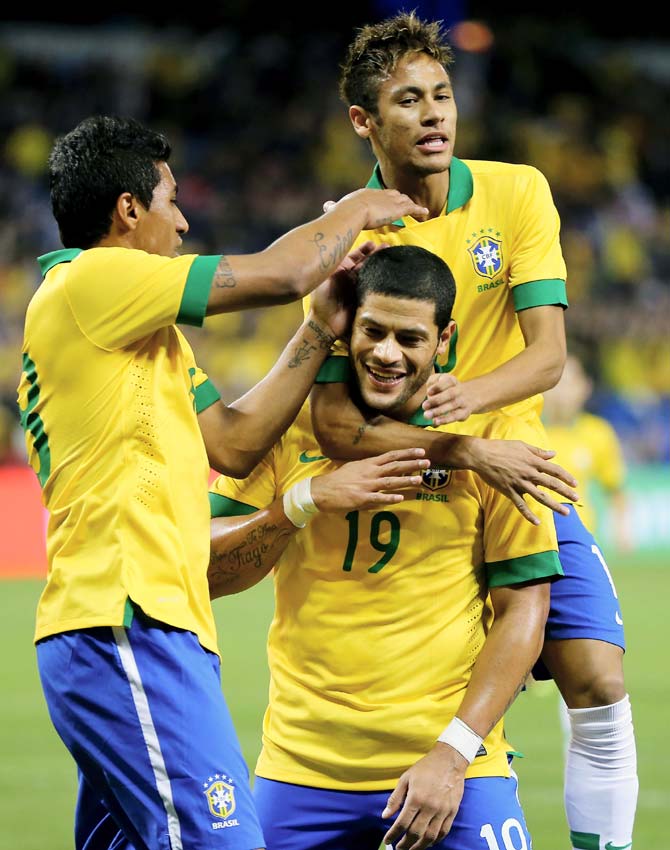 Brazil's Neymar (right), Hulk (centre) and Paulinho