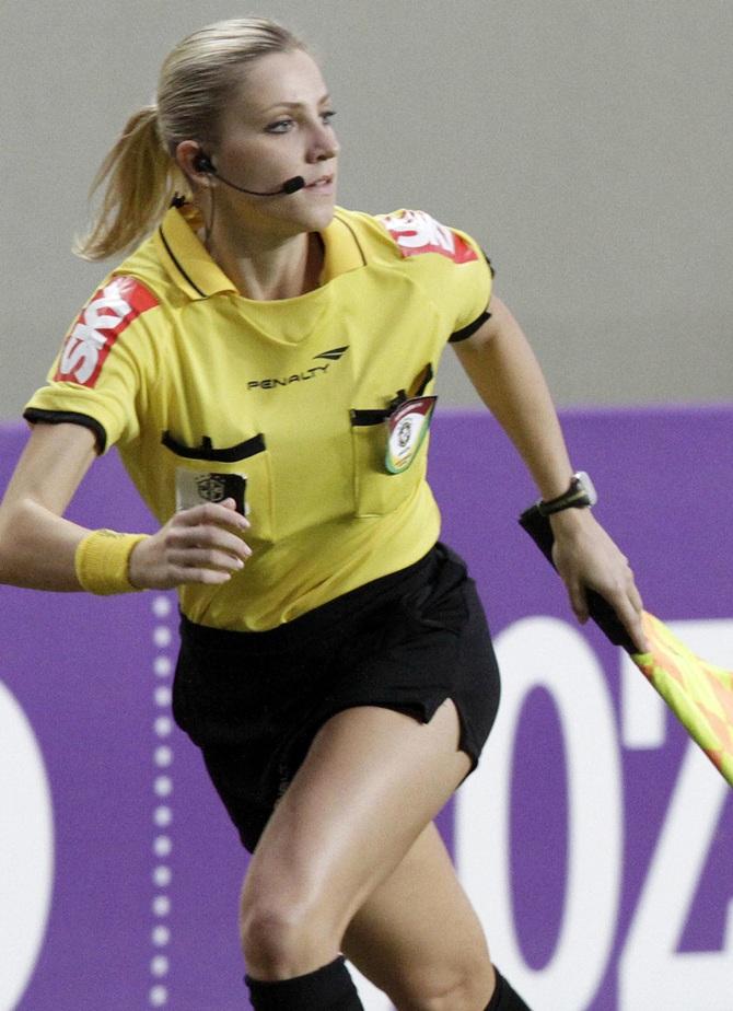 Brazil's referee assistant Fernanda Colombo Uliana officiates in the Brazilian championship soccer match between Atletico Mineiro and Cruzeiro in Belo Horizonte.