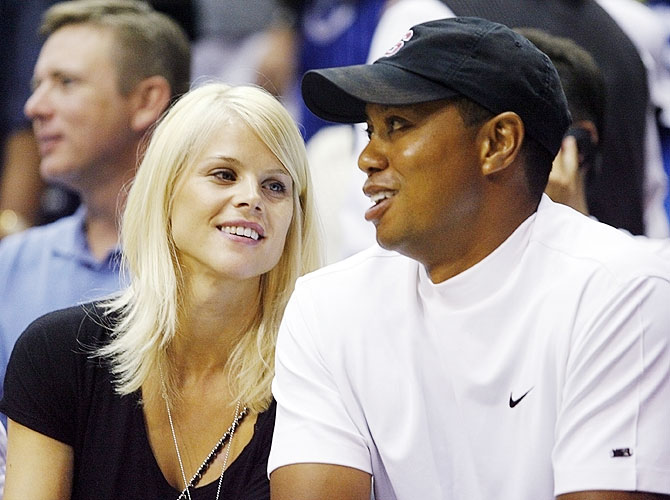 Tiger Woods and with Elin Nordegren (left)