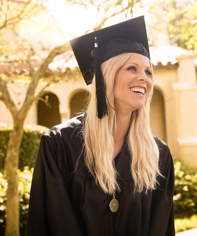 Elin Nordegren receives the   Hamilton Holt Outstanding Senior Award for the Class of 2014 during her graduation from Rollins College