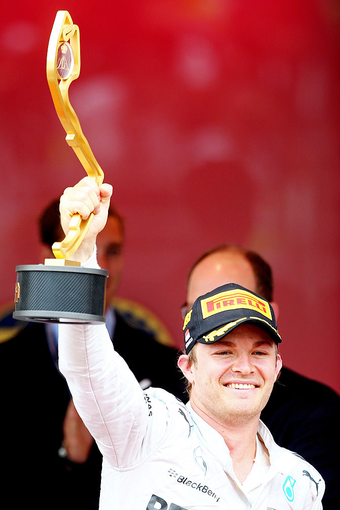 Race winner Nico Rosberg of Germany and Mercedes GP celebrates with the trophy following the Monaco Formula One Grand Prix at Circuit de Monaco in Monte-Carlo, Monaco on Sunday
