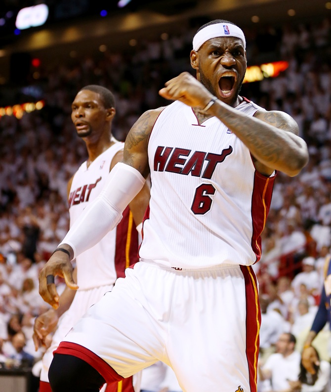 LeBron James of the Miami Heat reacts after a basket against the Indiana Pacers