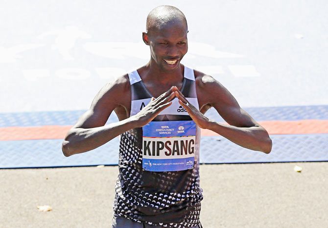 Wilson Kipsang of Kenya celebrates after crossing the finish line to win theNew York City Marathon in Central Park on Sunday