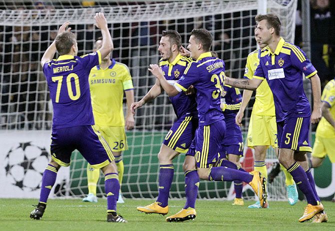 Maribor's Agim Ibraimi (centre) celebrates with team mates after scoring against Chelsea