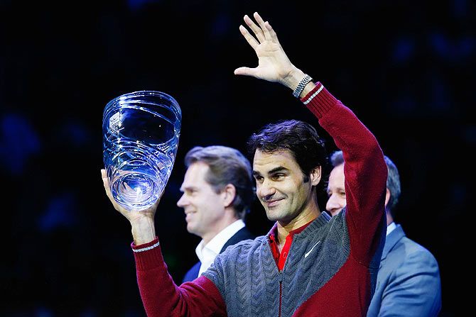 Roger Federer of Switzerland recieves the Moet & Chandon Stefan Edberg Sportmanship Award on Sunday