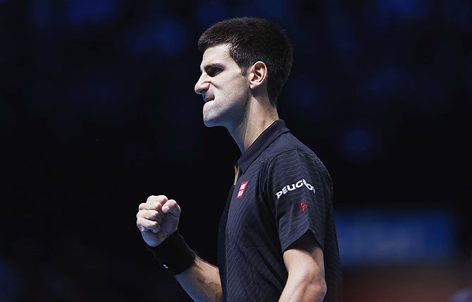 Novak Djokovic of Serbia reacts during his tennis match against Stan Wawrinka of Switzerland on Wednesday