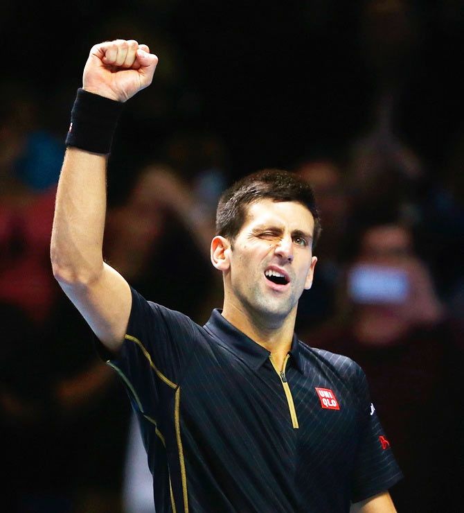 Novak Djokovic of Serbia acknowledges the crowd after his semi-final match win against Kei Nishikori of Japan